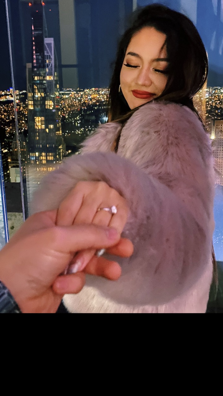 Photograph of a beautiful couple getting engaged