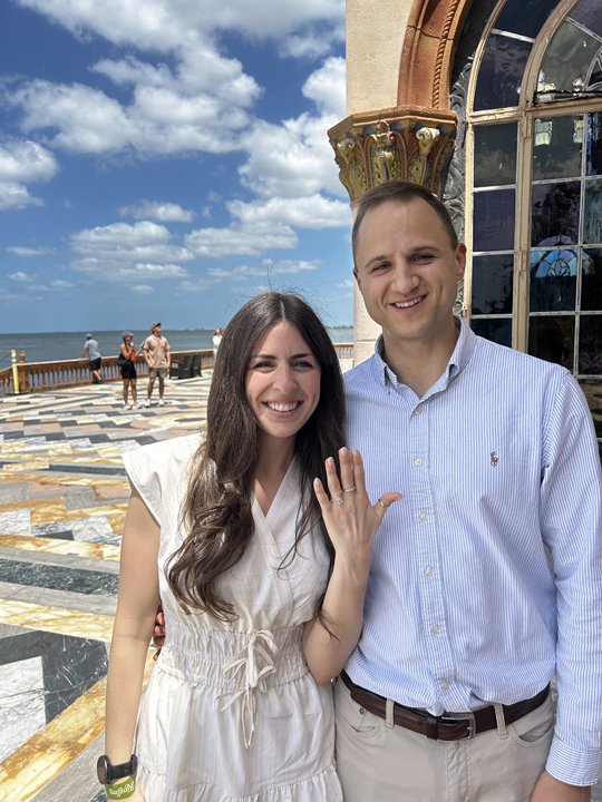 Photograph of a beautiful couple getting engaged