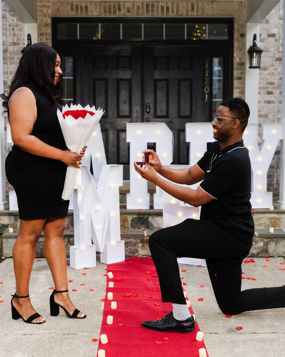 Photograph of a beautiful couple getting engaged